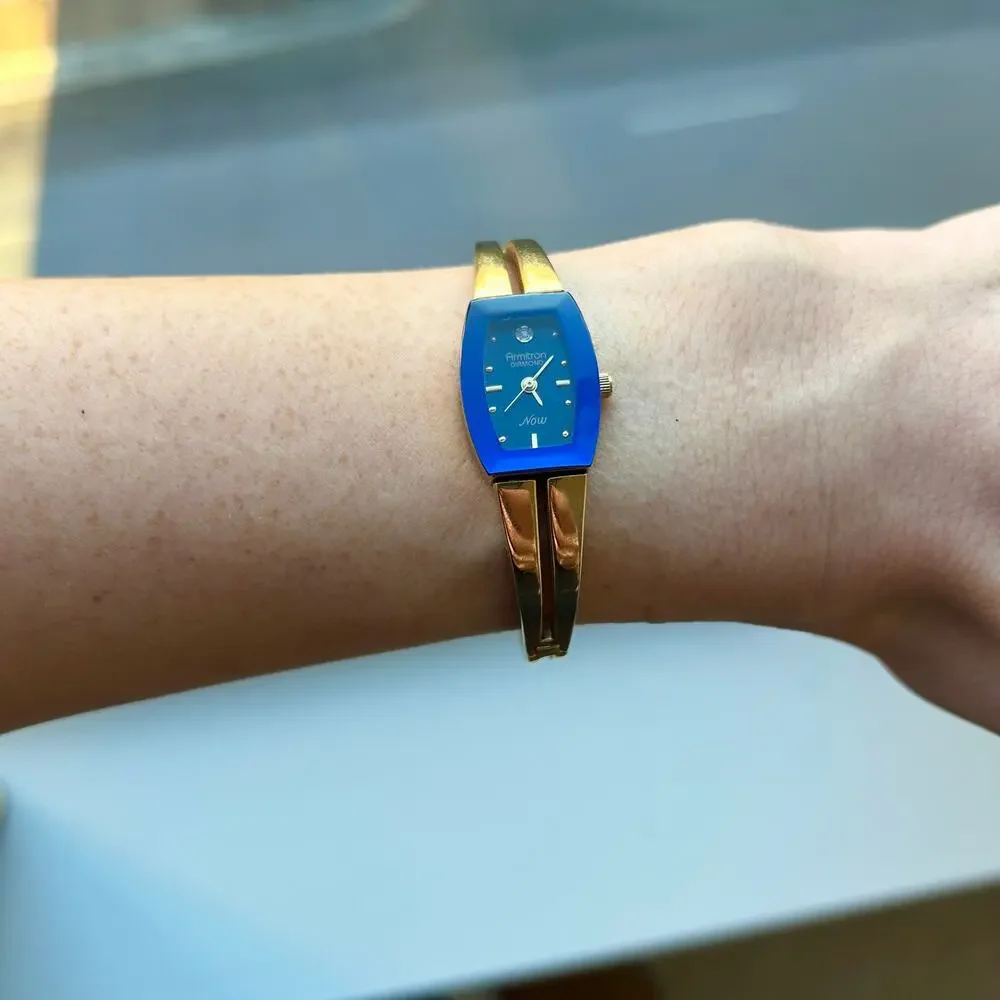 Armitron Diamond Now Blue Dial Gold Tone Bangle Watch